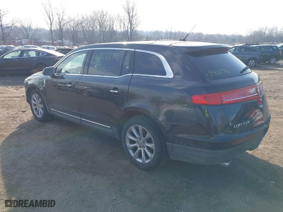 2013 Lincoln MKT EcoBoost with VIN 2LMHJ5AT6DBL55328, listed as a IAAI auction lot 41806881 with 72,740 mi miles. Bid and sale history available at carsss.com. Image 3.