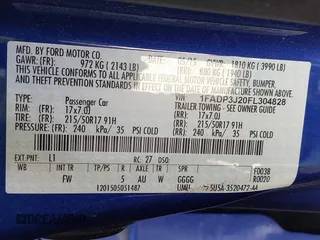 2015 Ford Focus Titanium with VIN 1FADP3J20FL304828, listed as a IAAI auction lot 42144101 with 199,715 mi miles and . Bid and sale history available at carsss.com. Image 9.