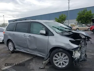 2012 Toyota Sienna XLE with VIN 5TDDK3DC9CS042847, listed as a IAAI auction lot 40970090 with 101,813 mi miles. Bid and sale history available at carsss.com. Image 19.