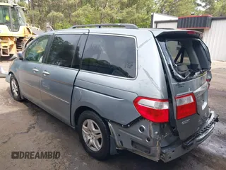 2006 Honda Odyssey EX with VIN 5FNRL38406B066176, listed as a IAAI auction lot 42028052 with 136,305 mi miles and . Bid and sale history available at DreamBid. Image 3.