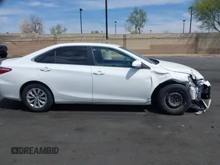2015 Toyota Camry XLE with VIN 4T1BF1FK3FU114299, listed as a IAAI auction lot 42024946 with 152,972 mi miles. Bid and sale history available at carsss.com. Image 13.