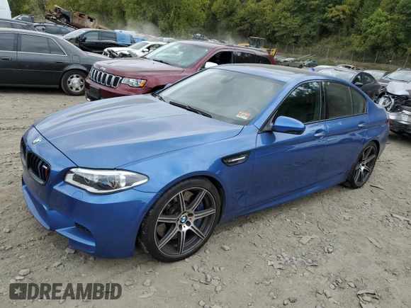 2014 BMW M5 z VIN WBSFV9C5XED097563, wystawiony jako Copart lot #72175354 z przebiegiem 73 406 mil mil oraz Szkody całkowita. Historia ofert i sprzedaży dostępna na DreamBid. Obrazek 1.