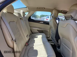 2014 Lincoln MKZ Hybrid z VIN 3LN6L2LU6ER819769, wystawiony jako Copart lot #65645965 z przebiegiem 142 623 mil mil oraz Szkoda całkowita • Salvage title. Historia ofert i sprzedaży dostępna na DreamBid. Obrazek 10.