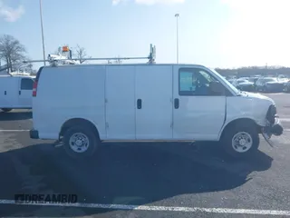 2015 Chevrolet Express Cargo with VIN 1GCWGFCF1F1161498, listed as a IAAI auction lot 41878871 with 157,365 mi miles. Bid and sale history available at carsss.com. Image 13.