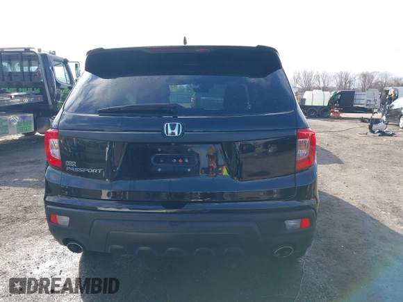 2021 Honda Passport EX-L with VIN 5FNYF7H56MB009450, listed as a IAAI auction lot 41474645 with 91,140 mi miles. Bid and sale history available at carsss.com. Image 16.
