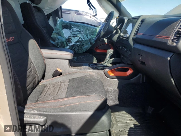 2024 Nissan Frontier Pro-4X with VIN 1N6ED1EK7RN610467, listed as a Copart auction lot 50138015 with 24,723 mi miles and Salvage title. Bid and sale history available at DreamBid. Image 7.