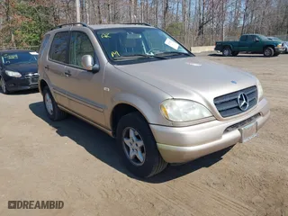 2001 Mercedes-Benz M-Class with VIN 4JGAB54E91A251754, listed as a IAAI auction lot 41784883 with 148,288 mi miles. Bid and sale history available at carsss.com. Image 1.