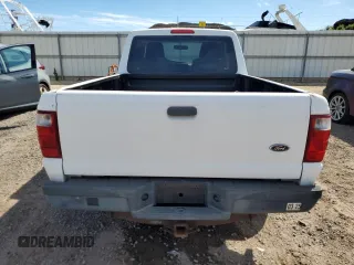 2004 Ford Ranger XL with VIN 1FTZR14U84PB06774, listed as a Copart auction lot 82596884 with 104,796 mi miles and Salvage Title. Bid and sale history available at DreamBid. Image 6.