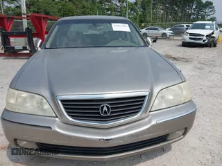2002 Acura RL z VIN JH4KA96542C001374, wystawiony jako IAAI lot #42425314 z przebiegiem Nie podano mil oraz . Historia ofert i sprzedaży dostępna na DreamBid. Obrazek 6.