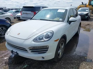2014 Porsche Cayenne with VIN WP1AA2A21ELA94214, listed as a IAAI auction lot 42389334 with 114,276 mi miles and . Bid and sale history available at DreamBid. Image 17.