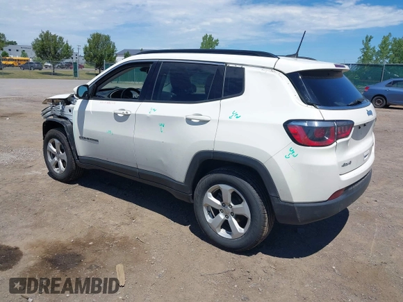 2020 Jeep Compass Latitude with VIN 3C4NJDBBXLT219466, listed as a IAAI auction lot 39766901 with 147,492 mi miles and . Bid and sale history available at DreamBid. Image 3.