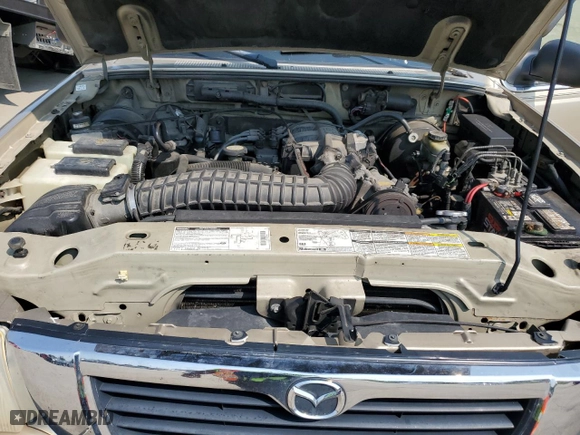 1999 Mazda B-Series 4WD Truck SE with VIN 4F4ZR17X4XTM06787, listed as a Copart auction lot 64600754 with 152,364 mi miles and Salvage Title. Bid and sale history available at carsss.com. Image 11.