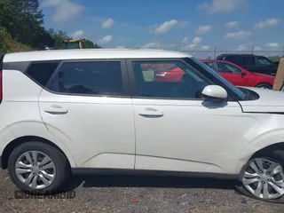 2023 Kia Soul LX with VIN KNDJ23AU7P7840988, listed as a IAAI auction lot 42106991 with 48,752 mi miles. Bid and sale history available at carsss.com. Image 13.