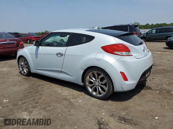 2015 Hyundai Veloster z VIN KMHTC6AD2FU221623, wystawiony jako Copart lot #58222615 z przebiegiem 176 801 mil mil oraz Czysty tytuł • Clean title. Historia ofert i sprzedaży dostępna na DreamBid. Obrazek 2.