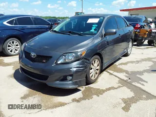 2010 Toyota Corolla with VIN 2T1BU4EEXAC463697, listed as a IAAI auction lot 42099807 with 206,160 mi miles. Bid and sale history available at carsss.com. Image 2.