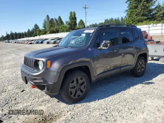 2018 Jeep Renegade Trailhawk z VIN ZACCJBCBXJPG97207, wystawiony jako Copart lot #63108045 z przebiegiem 57 361 mil mil oraz Szkoda całkowita • Salvage title. Historia ofert i sprzedaży dostępna na DreamBid. Obrazek 1.