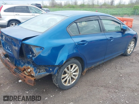 2012 Honda Civic EX with VIN 2HGFB2F86CH544873, listed as a IAAI auction lot 42192313 with 285,400 mi miles and . Bid and sale history available at DreamBid. Image 4.