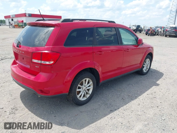 2013 Dodge Journey SXT with VIN 3C4PDDBGXDT641427, listed as a IAAI auction lot 42604902 with 149,256 mi miles and . Bid and sale history available at DreamBid. Image 4.