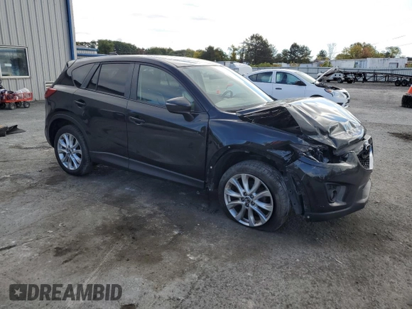2015 Mazda CX-5 Grand Touring with VIN JM3KE4DY2F0480639, listed as a Copart auction lot 75248594 with 104,652 mi miles and Non Repairable. Bid and sale history available at carsss.com. Image 4.