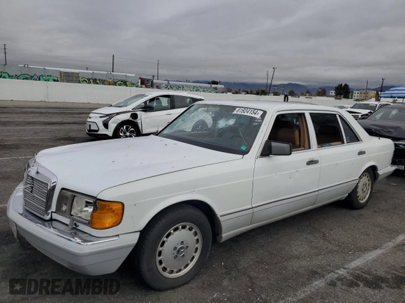 1989 Mercedes-Benz 560 with VIN WDBCA39E2KA479060, listed as a Copart auction lot 81924154 with 172,377 mi miles and Salvage Title. Bid and sale history available at DreamBid. Image 1.