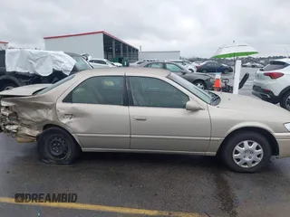 1997 Toyota Camry LE z VIN 4T1BG22K9VU786181, wystawiony jako IAAI lot #41610928 z przebiegiem 338 829 mil mil oraz . Historia ofert i sprzedaży dostępna na DreamBid. Obrazek 13.