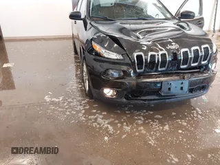 2015 Jeep Cherokee Latitude with VIN 1C4PJLCB9FW536767, listed as a IAAI auction lot 41380122 with 192,535 mi miles. Bid and sale history available at carsss.com. Image 6.