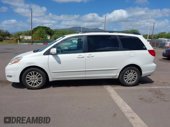 2010 Toyota Sienna XLE with VIN 5TDYK4CC7AS291119, listed as a IAAI auction lot 41742917 with 201,590 mi miles. Bid and sale history available at carsss.com. Image 14.