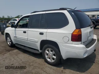 2003 GMC Envoy SLE z VIN 1GKDT13S732228585, wystawiony jako Copart lot #58764565 z przebiegiem 151 107 mil mil oraz Szkoda całkowita • Salvage title. Historia ofert i sprzedaży dostępna na DreamBid. Obrazek 2.