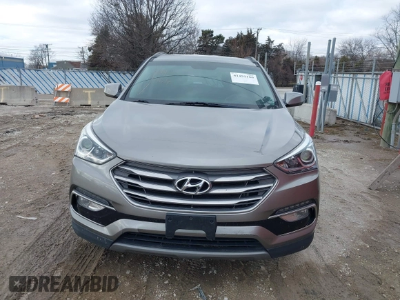 2017 Hyundai Santa Fe 2.4L with VIN 5XYZU3LB4HG424734, listed as a IAAI auction lot 41491166 with 130,905 mi miles and . Bid and sale history available at DreamBid. Image 12.