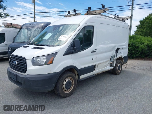 2019 Ford Transit z VIN 1FTYR1CM7KKB27266, wystawiony jako IAAI lot #42290305 z przebiegiem 129 746 mil mil oraz . Historia ofert i sprzedaży dostępna na DreamBid. Obrazek 2.