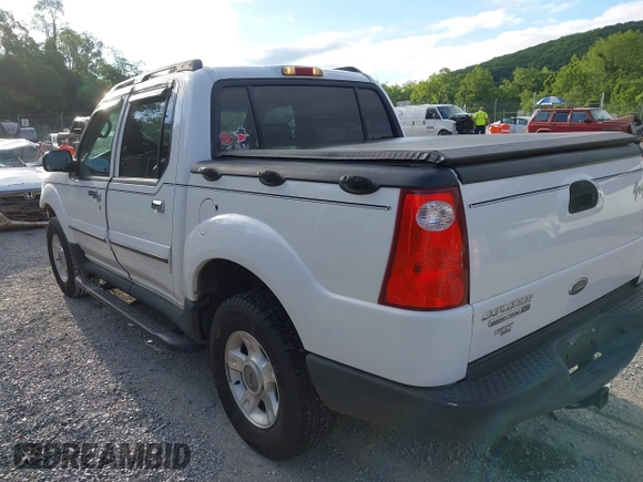 2003 Ford Explorer Sport Trac XLS z VIN 1FMZU77E33UA26042, wystawiony jako IAAI lot #42524905 z przebiegiem 124 878 mil mil oraz . Historia ofert i sprzedaży dostępna na DreamBid. Obrazek 3.