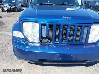 2009 Jeep Liberty Sport with VIN 1J8GN28K69W533457, listed as a IAAI auction lot 41831960 with 185,403 mi miles. Bid and sale history available at carsss.com. Image 6.
