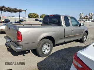 2002 Ford F-150 XL z VIN 1FTRX17232KC51909, wystawiony jako Copart lot #62081725 z przebiegiem Nie podano mil oraz Czysty tytuł • Clean title. Historia ofert i sprzedaży dostępna na DreamBid. Obrazek 3.