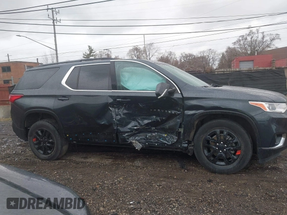 2021 Chevrolet Traverse LT Cloth z VIN 1GNERGKW9MJ234571, wystawiony jako IAAI lot #41844031 z przebiegiem 58 785 mil mil oraz . Historia ofert i sprzedaży dostępna na DreamBid. Obrazek 13.
