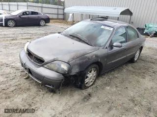 2004 Mercury Sable LS Premium with VIN 1MEHM55S74A622379, listed as a Copart auction lot 73611144 with 0 mi miles and Salvage Title. Bid and sale history available at carsss.com. Image 1.
