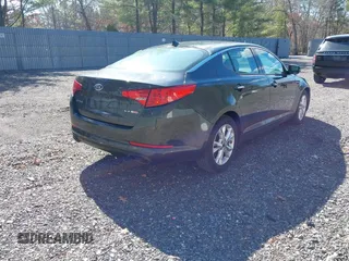 2011 Kia Optima EX with VIN KNAGN4A61B5131919, listed as a IAAI auction lot 41740091 with 102,065 mi miles and . Bid and sale history available at carsss.com. Image 4.