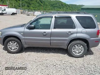2007 Mercury Mariner Luxury z VIN 4M2CU91157KJ09026, wystawiony jako IAAI lot #42312495 z przebiegiem 156 572 mil mil oraz . Historia ofert i sprzedaży dostępna na DreamBid. Obrazek 14.