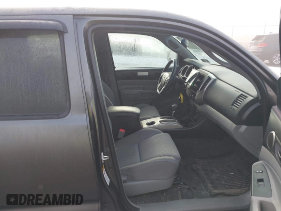 2015 Toyota Tacoma with VIN 3TMLU4EN7FM201302, listed as a IAAI auction lot 41666606 with 200,504 mi miles and . Bid and sale history available at DreamBid. Image 5.