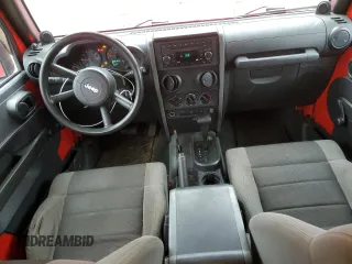 2007 Jeep Wrangler Unlimited X with VIN 1J4GA39137L111198, listed as a Copart auction lot 44244805 with 157,922 mi miles and Salvage Title. Bid and sale history available at DreamBid. Image 8.