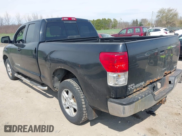 2010 Toyota Tundra 4WD Truck with VIN 5TFUM5F14AX015516, listed as a IAAI auction lot 42118639 with 204,489 mi miles. Bid and sale history available at carsss.com. Image 3.