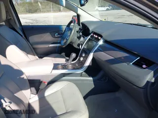 2011 Ford Edge SEL with VIN 2FMDK4JC1BBB04411, listed as a IAAI auction lot 41704037 with 235,673 mi miles. Bid and sale history available at carsss.com. Image 5.