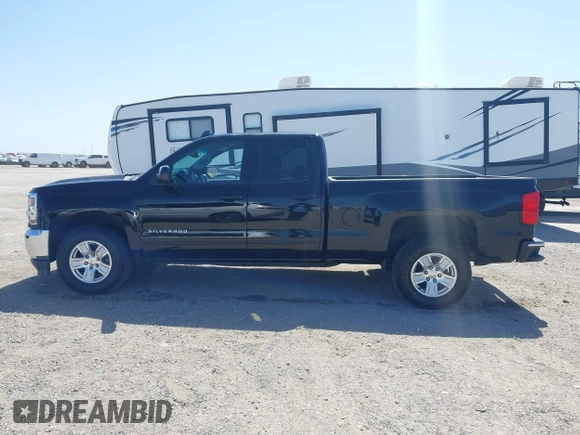 2018 Chevrolet Silverado 1500 LT with VIN 1GCRCREC5JZ127362, listed as a IAAI auction lot 41859085 with 158,364 mi miles and . Bid and sale history available at DreamBid. Image 14.