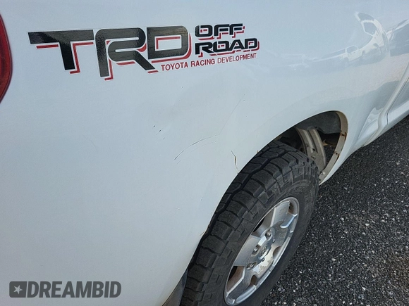 2011 Toyota Tundra with VIN 5TFUY5F1XBX198815, listed as a IAAI auction lot 42571444 with 281,114 mi miles and . Bid and sale history available at DreamBid. Image 36.
