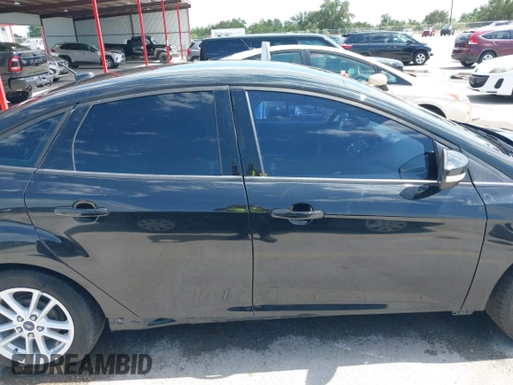 2015 Ford Focus SE with VIN 1FADP3F2XFL313657, listed as a IAAI auction lot 42205474 with 161,353 mi miles and . Bid and sale history available at DreamBid. Image 13.