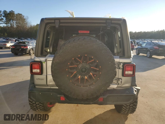 2020 Jeep Wrangler Unlimited Rubicon with VIN 1C4HJXFG6LW309146, listed as a Copart auction lot 88423285 with 65,288 mi miles and Salvage title. Bid and sale history available at DreamBid. Image 6.
