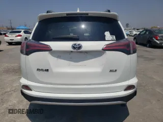 2018 Toyota RAV4 XLE with VIN JTMWFREVXJD118021, listed as a Copart auction lot 58845805 with 108,068 mi miles and Salvage title. Bid and sale history available at DreamBid. Image 6.
