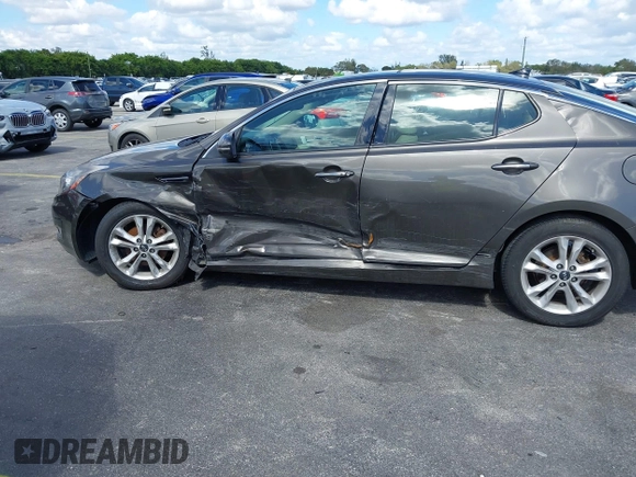 2011 Kia Optima EX with VIN KNAGN4A74B5164311, listed as a IAAI auction lot 41558907 with Not Provided miles and . Bid and sale history available at carsss.com. Image 6.