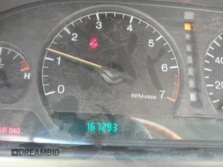 2002 Cadillac Eldorado ESC z VIN 1G6EL12Y92B100484, wystawiony jako IAAI lot #42418094 z przebiegiem 167 293 mil mil oraz . Historia ofert i sprzedaży dostępna na DreamBid. Obrazek 7.