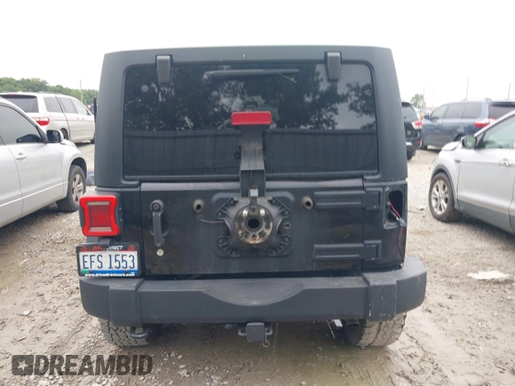 2018 Jeep Wrangler Unlimited Freedom z VIN 1C4BJWDG0JL803889, wystawiony jako IAAI lot #42782367 z przebiegiem 105 738 mil mil oraz . Historia ofert i sprzedaży dostępna na DreamBid. Obrazek 17.