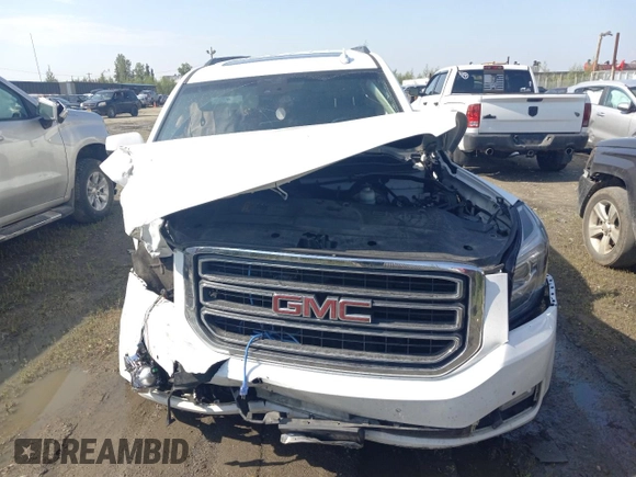 2019 GMC Yukon XL SLT with VIN 1GKS2GKC1KR279755, listed as a Copart auction lot 64695394 with 0 mi miles and Salvage Title. Bid and sale history available at carsss.com. Image 5.